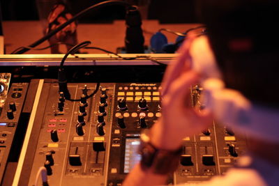 Cropped image of man playing guitar