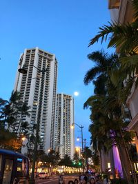 Low angle view of modern buildings against sky