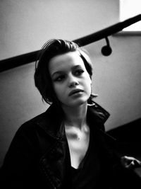 Portrait of young woman looking away