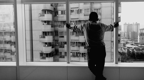 Woman standing in front of building