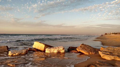 Scenic view of sea against sky during sunset