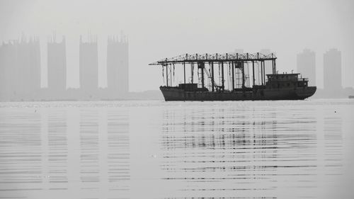 Ship in sea against sky