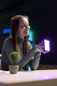 Young woman using mobile phone