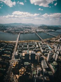 High angle view of river amidst buildings in city