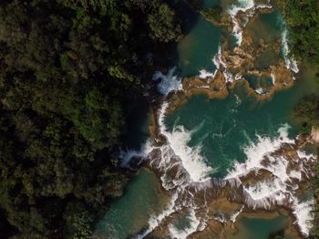 High angle view of rocks by a river