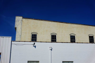 High section of building against clear sky