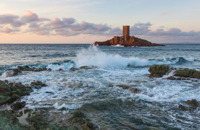 L'île d'or with its tower in front of the dramont beach in saint-raphaël