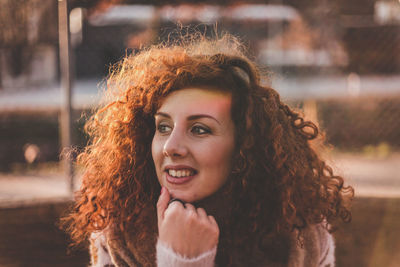 Close-up of redhead woman in warm clothing