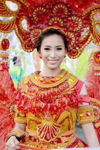 Portrait of young woman in traditional clothing