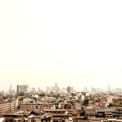 Buildings against clear sky