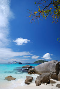 Scenic view of sea against blue sky