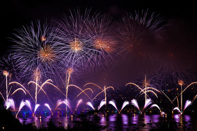 Firework display at night