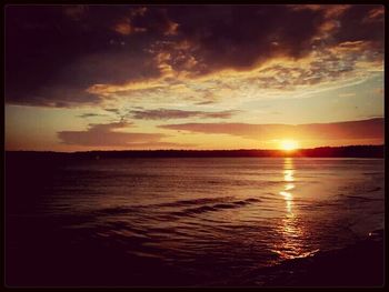 Scenic view of sea at sunset