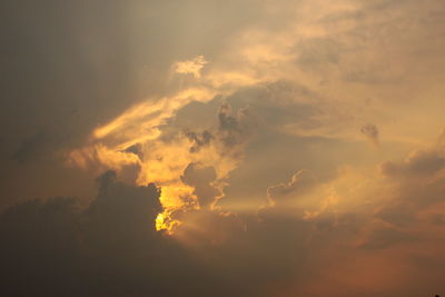 Low angle view of dramatic sky during sunset