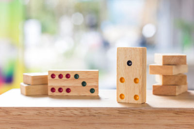 Close-up of wooden dominoes on table