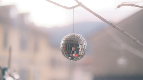 Low angle view of lighting equipment hanging on ceiling