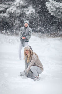 Full length of woman in snow