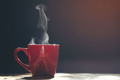 Close-up of coffee cup on table