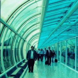 People standing on escalator