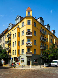 Residential buildings against sky in city