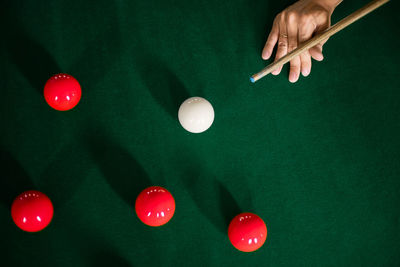High angle view of red ball on table