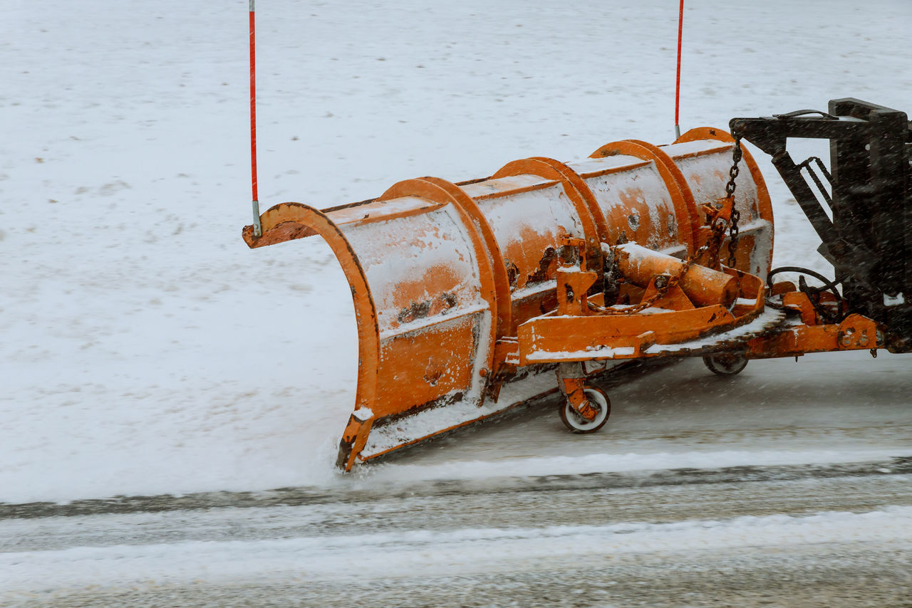 RUSTY BICYCLE ON SNOW COVERED LAND