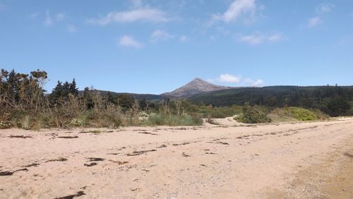 Scenic view of land against sky