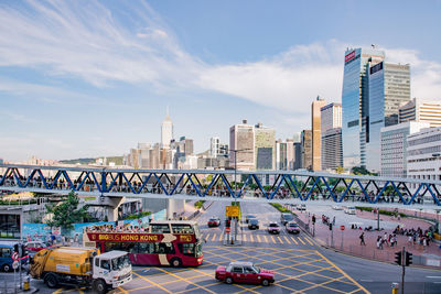 View of bridge and buildings against sky in city