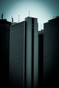 Low angle view of modern buildings against sky