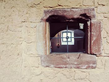 Built structure against brick wall