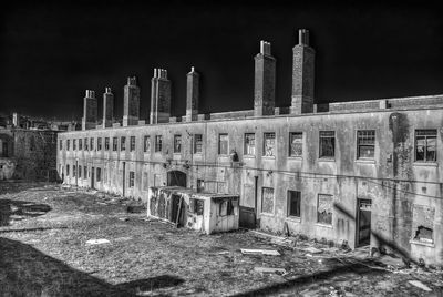 Abandoned building against sky