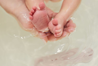 Cropped hand washing hands