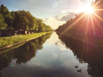 Reflection of sky on river during sunset