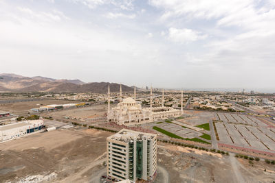 High angle view of buildings against sky