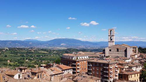 Aerial view of townscape against sky