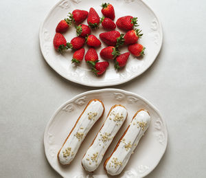 High angle view of strawberries in plate on table