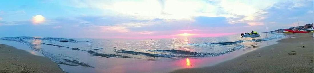 Scenic view of sea at sunset