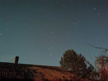 Low angle view of house against sky at night