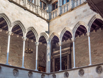 Low angle view of old building in city