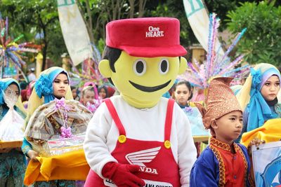 Happy friends in traditional clothing