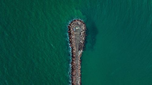 High angle view of ship sailing in sea