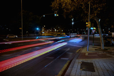 Light trails on road at night