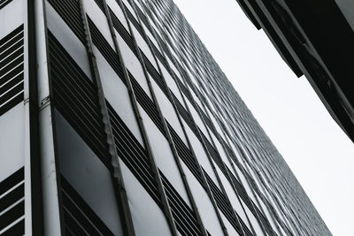 Low angle view of modern buildings against clear sky