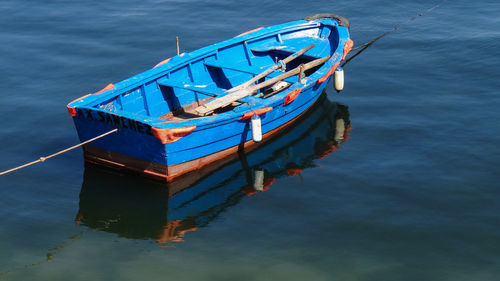 High angle view of fishing boat in lake