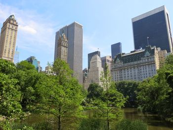 Low angle view of skyscrapers against sky