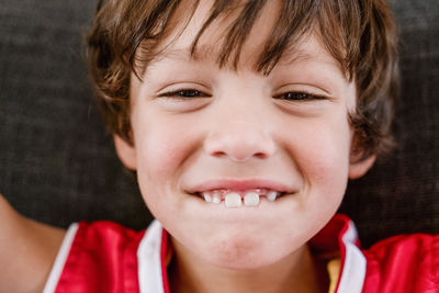 Close-up portrait of smiling boy