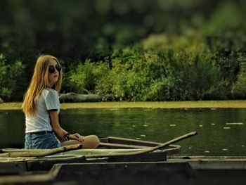 Man looking at lake