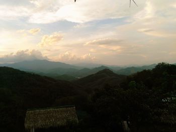 Scenic view of mountains against sky during sunset