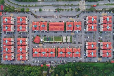 High angle view of multi colored umbrellas on city