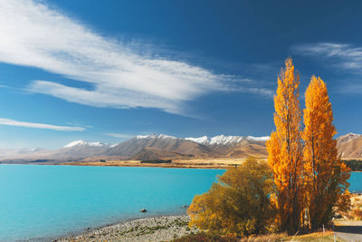 Scenic view of lake against sky during autumn